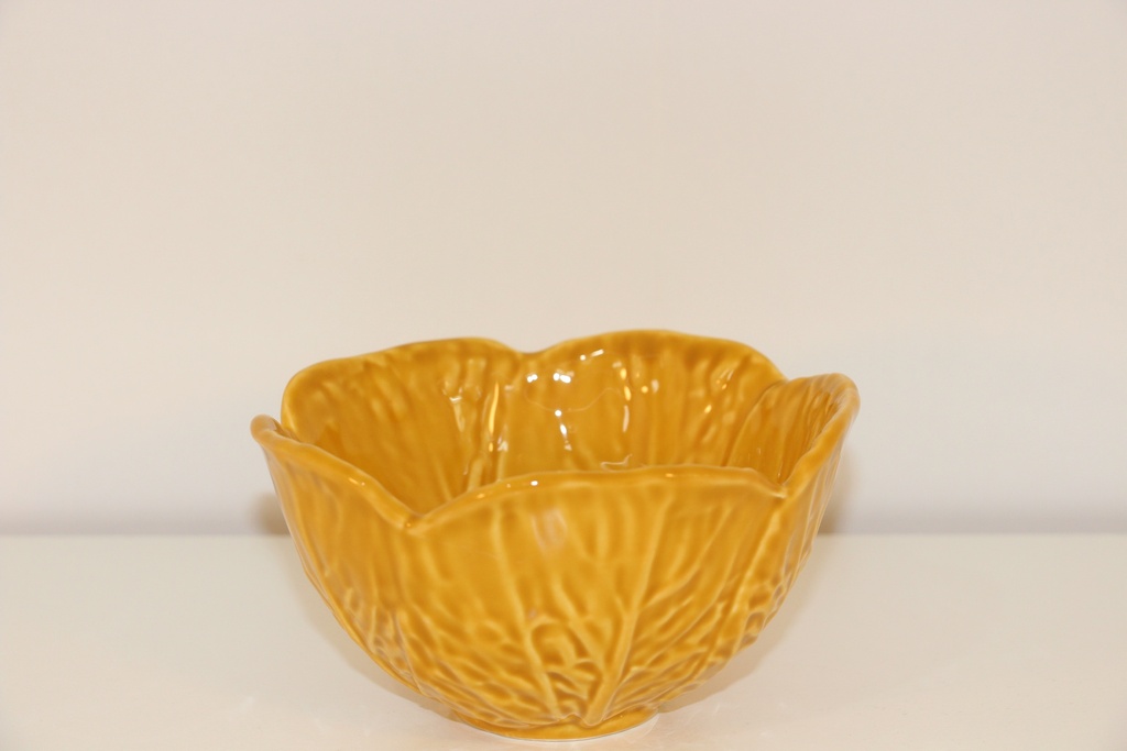 Taça de cerâmica amarela mostarda com design de folha